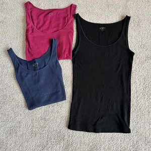 3 Loft size small tank tops in blue, pink and black